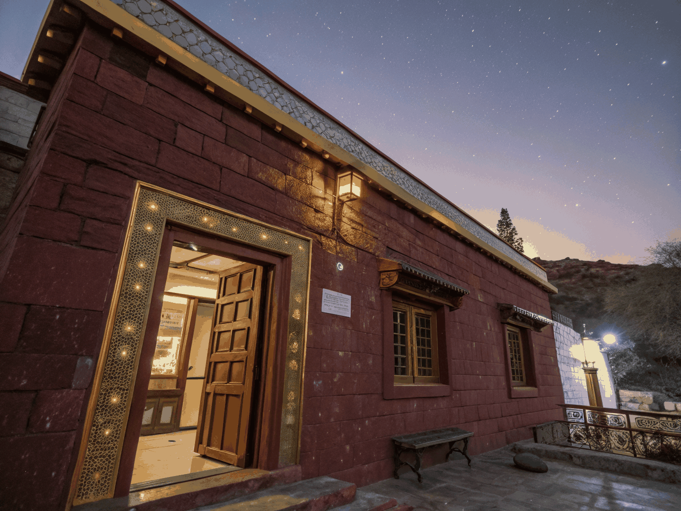 Candlelit stone courtyard retreat along the historic ghats of Varanasi